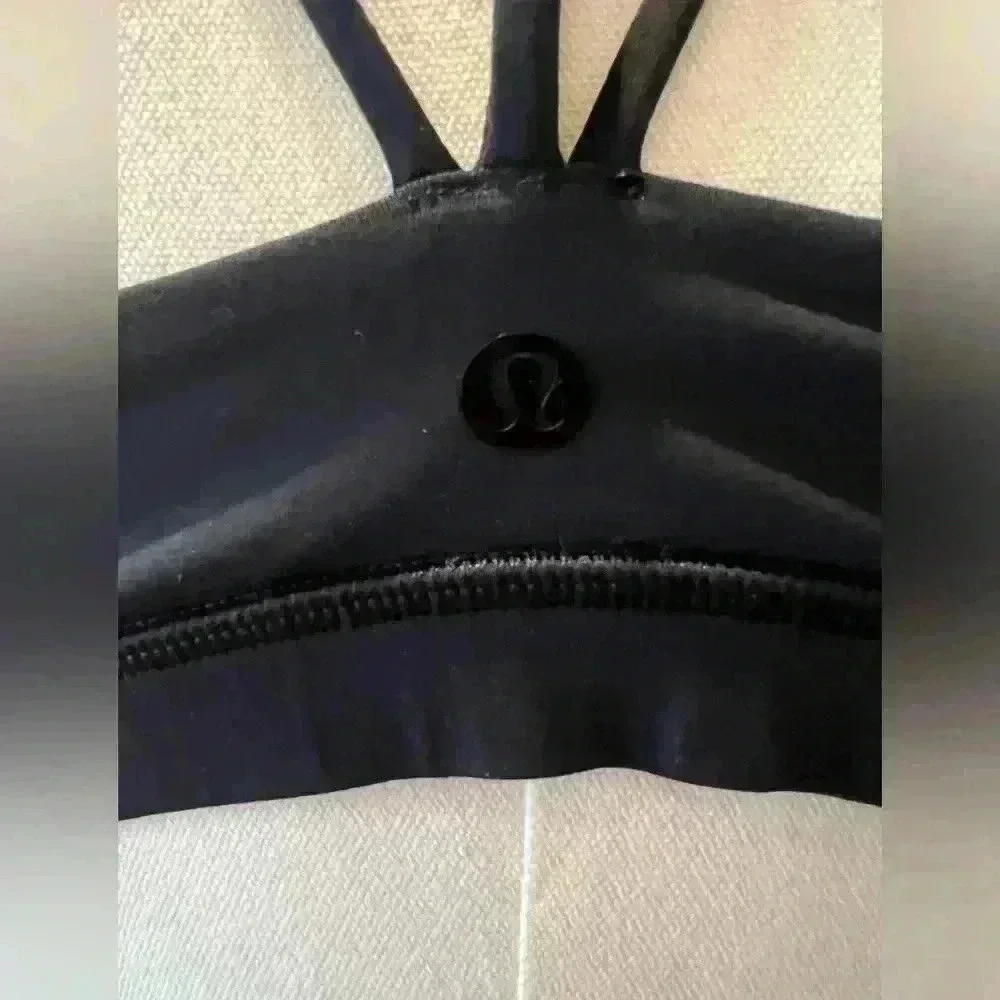 Lululemon Black tank with drape back and crisscross back straps. Size 8